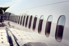 Airplane windows disembarking after arrival at vacation airport